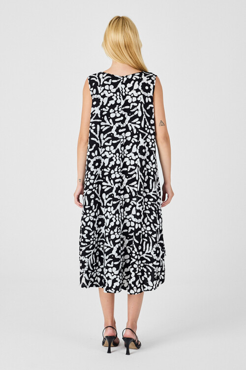 Siyah-Beyaz U Yaka Kolsuz Eteği Asimetrik Kesim Desenli Midi Boy Elbise