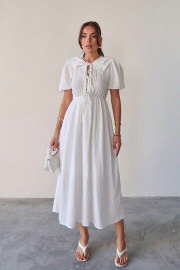 Beyaz Bebe Yaka Bağlamalı Astarlı Uzun Müslin Elbise