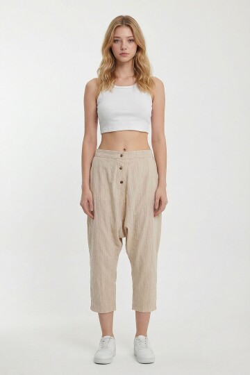 Bej Çift Cepli Düğme Detaylı Düşük Ağ Şalvar Pantolon